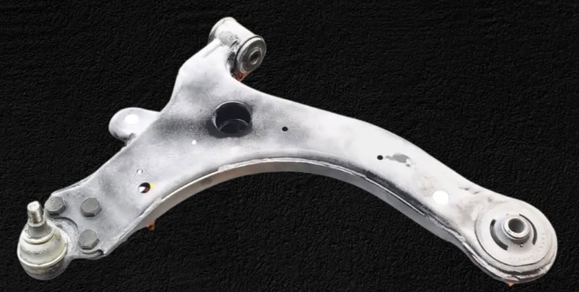 Precision machined vehicle control arm