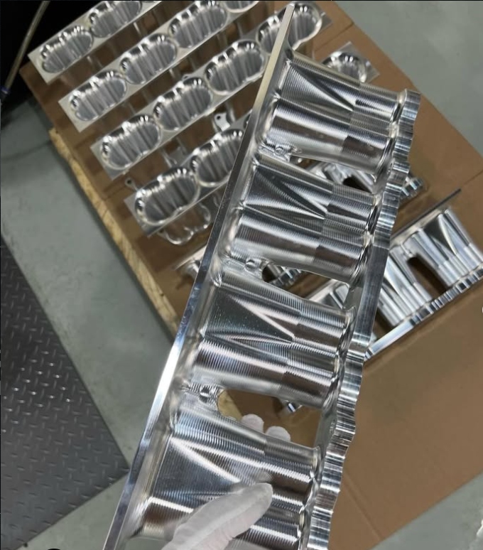 Batch of machined intake ports